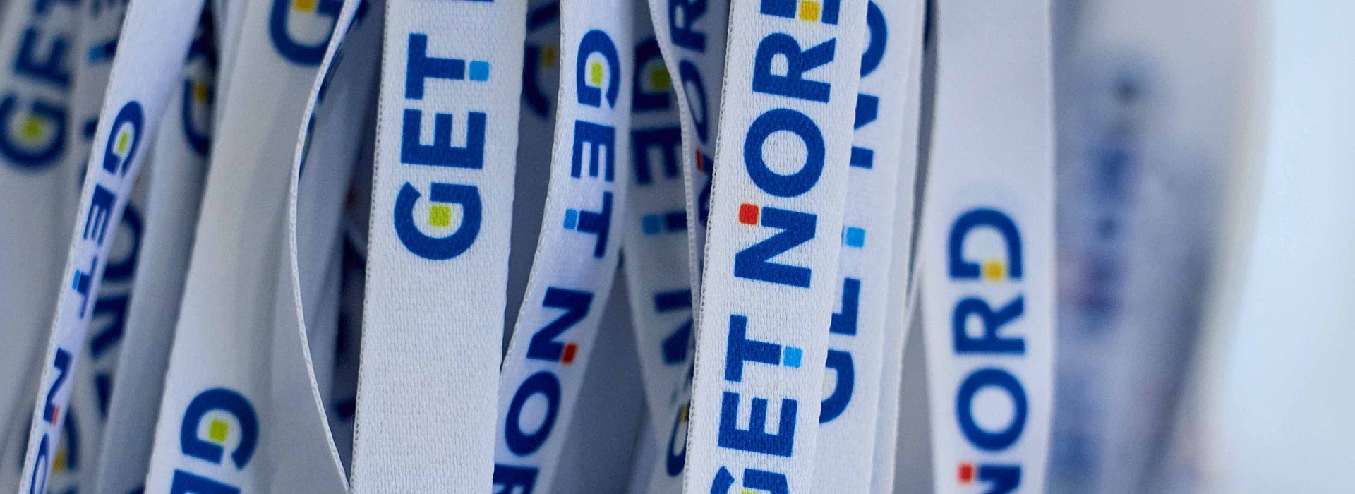 Close-up of the lanyards with GET NORD logo